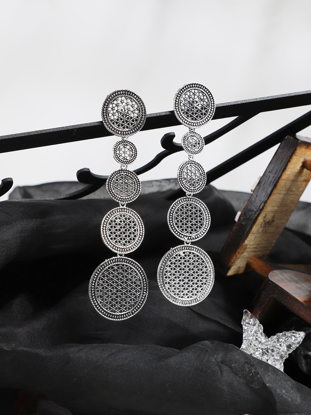 ANIKAS CREATION Silver-Toned Circular Drop Earrings