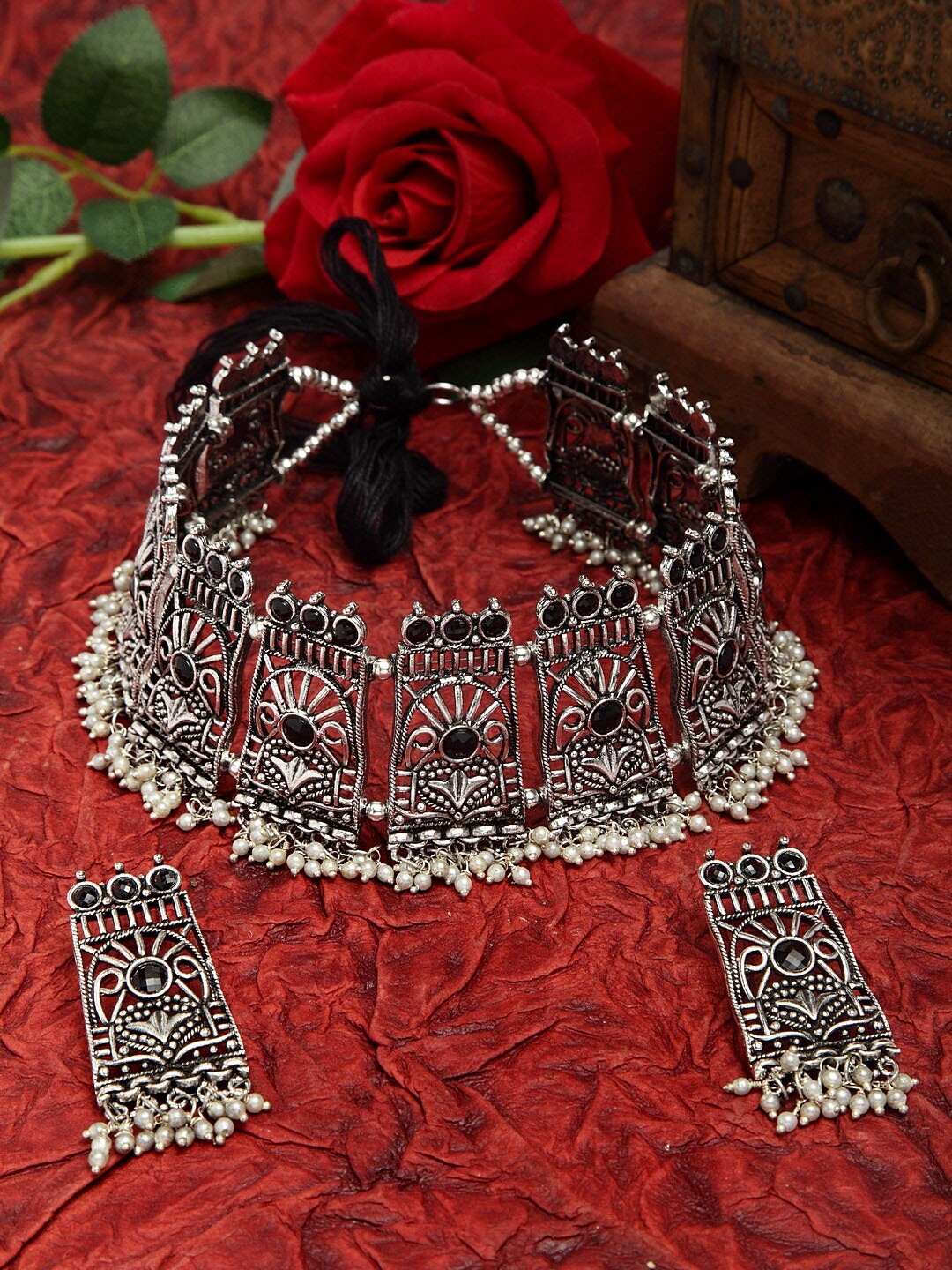 

Moedbuille Black Stone & Pearls Studded Oxidised Silver Plated Handcrafted Temple Jewelry Set