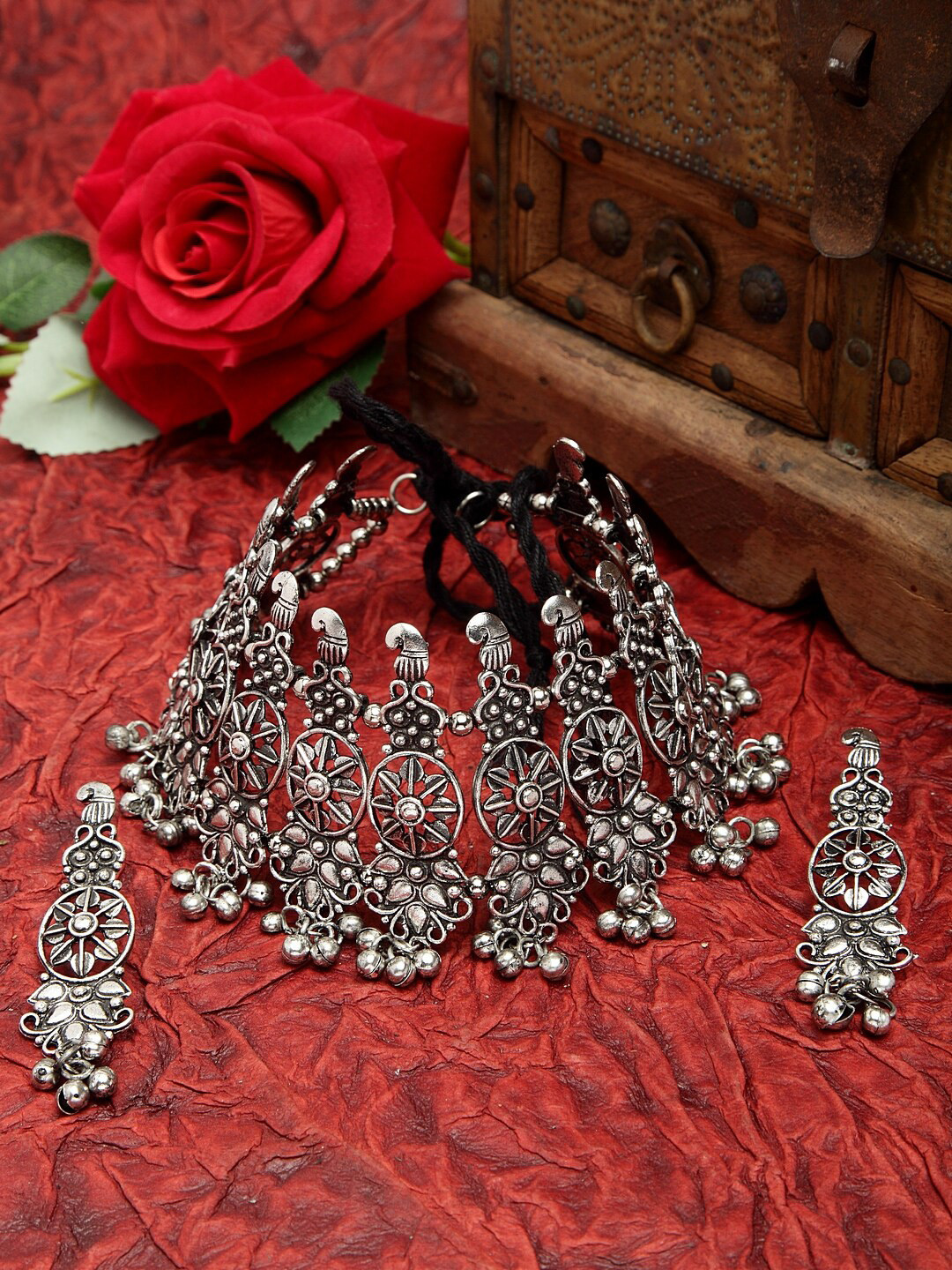 

Moedbuille White Stone & Ghungroo Studded Oxidised Silver Plated Handcrafted Temple Jewelry Set