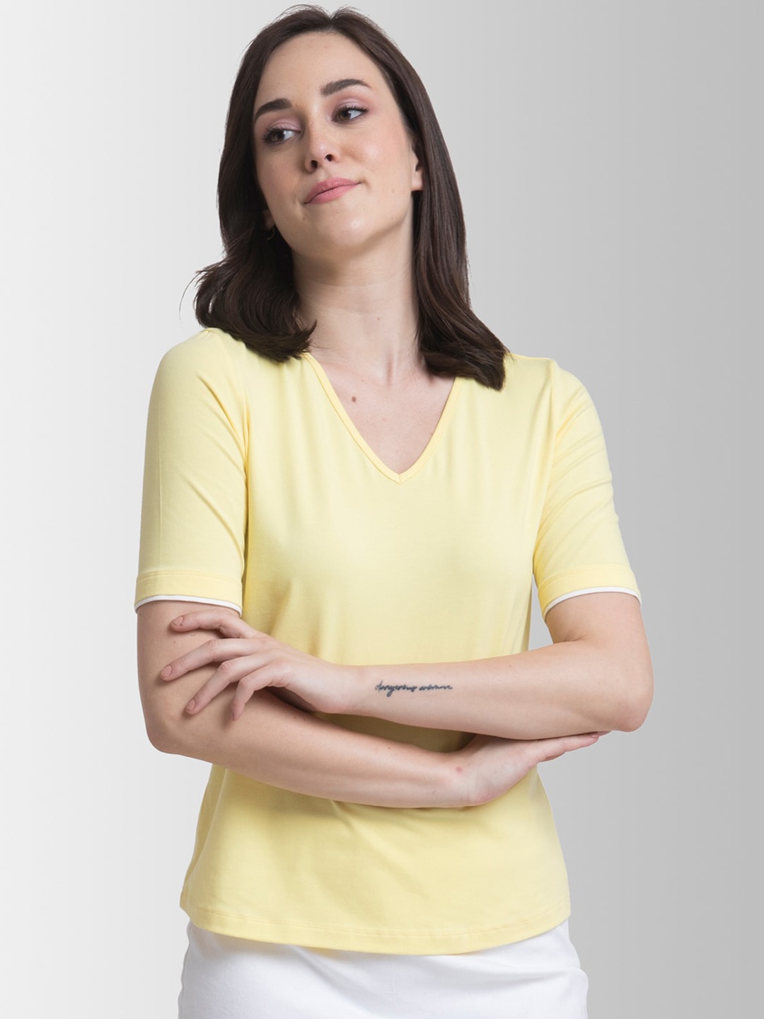

FableStreet Women Yellow Solid V-Neck T-shirt