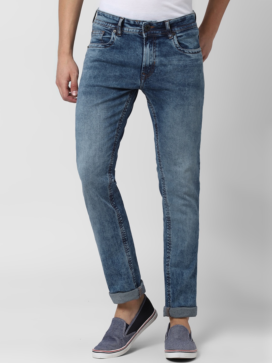 

Peter England Casuals Men Blue Heavy Fade Tapered Fit Jeans