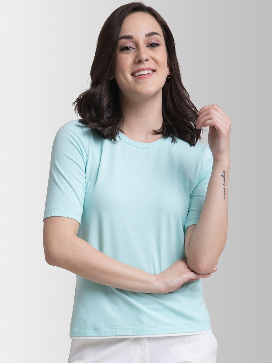 

FableStreet Women Blue Solid Round Neck T-shirt