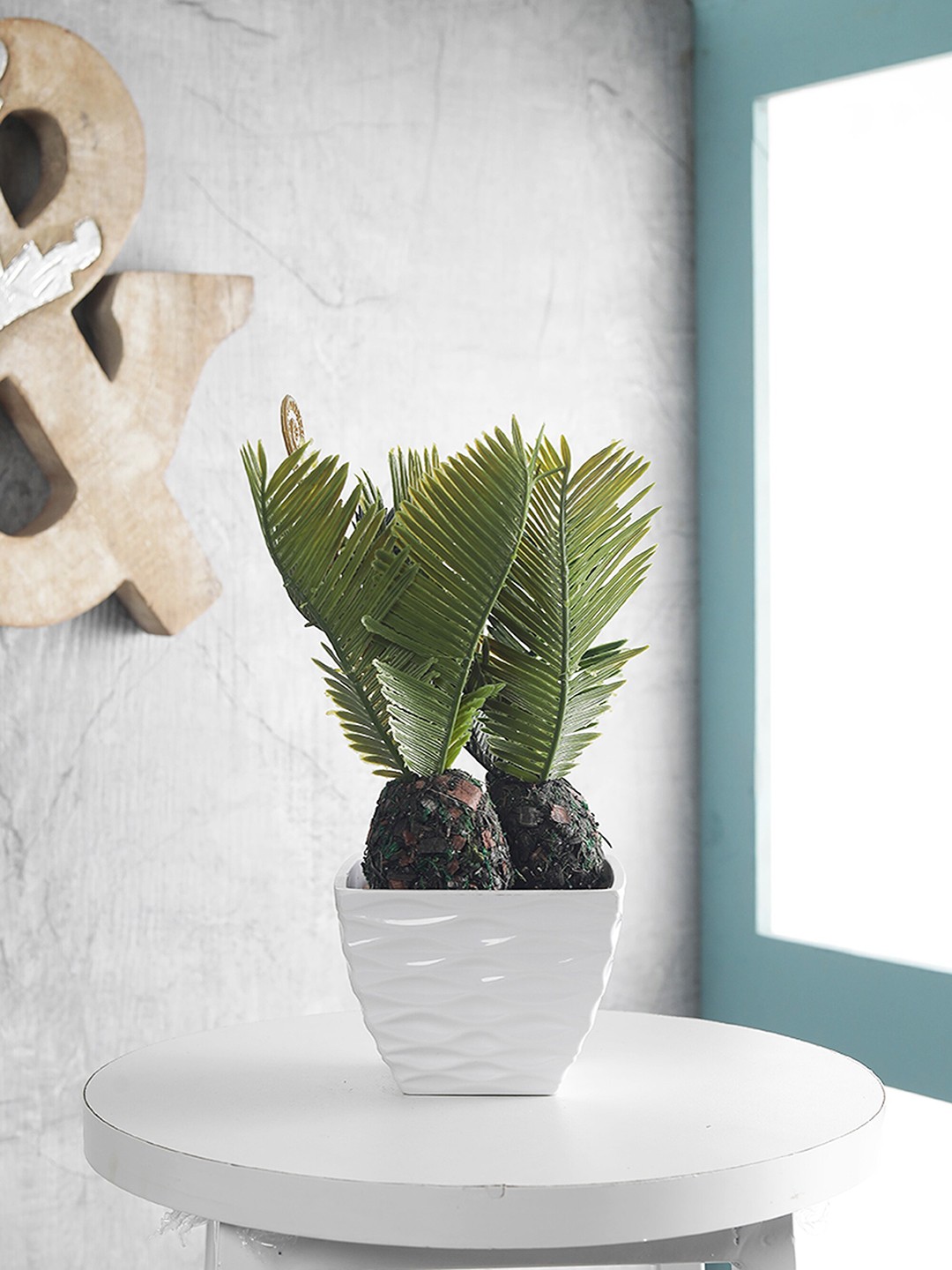 

FOLIYAJ Green Artificial Sago Palm With White Pyramid Shape Pot