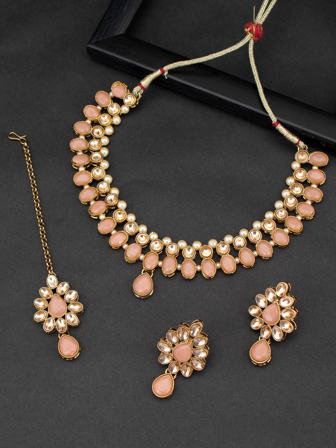 

Sukkhi LCT Gold-Plated Peach-Coloured & Beige Stone-Studded Sustainable Choker Jewellery Set