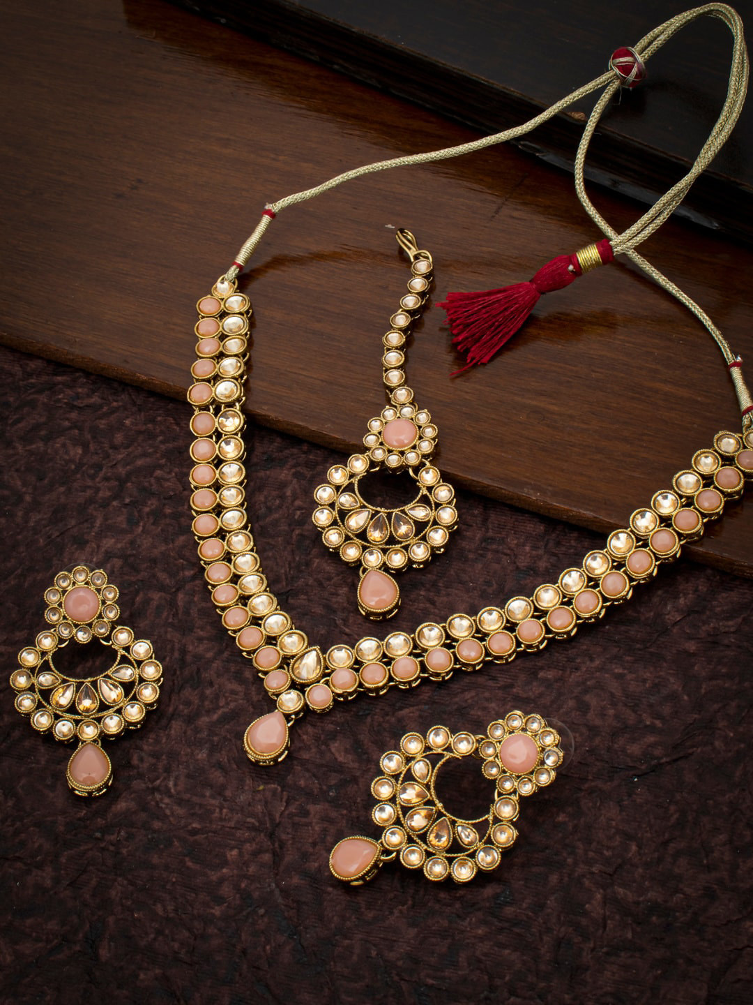

Sukkhi LCT Gold-Plated Peach-Coloured & Beige Stone-Studded Sustainable Jewellery Set
