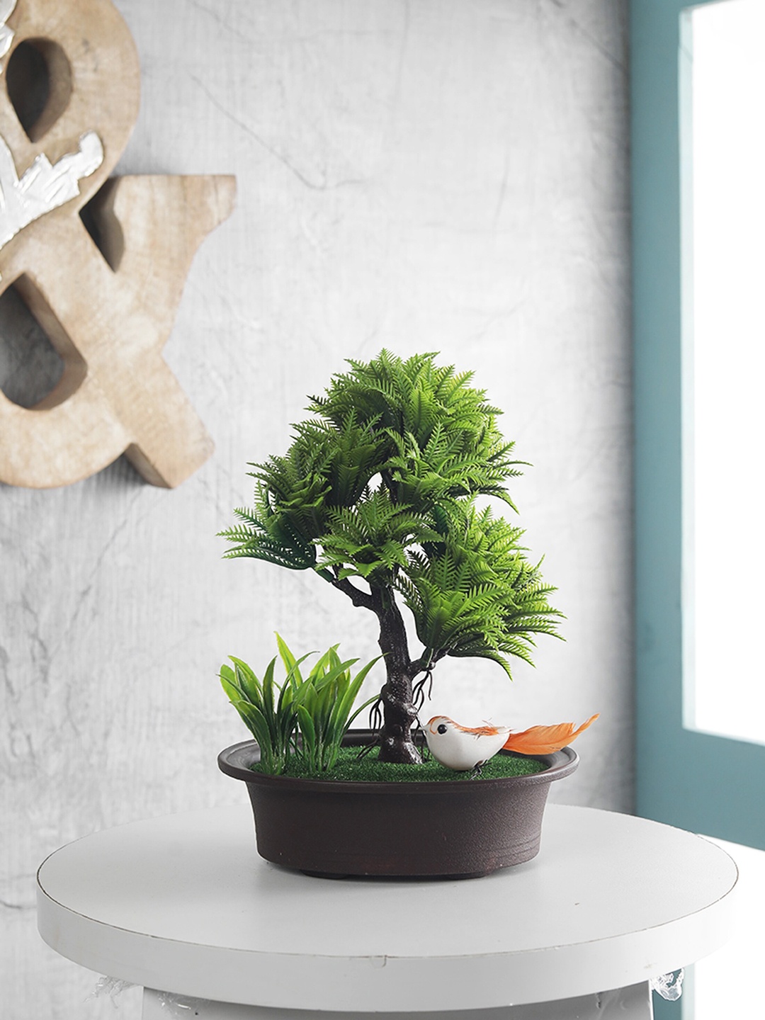 

FOLIYAJ Green Artificial Shoe Horn Shaped Bonsai Tree With Brown Pot