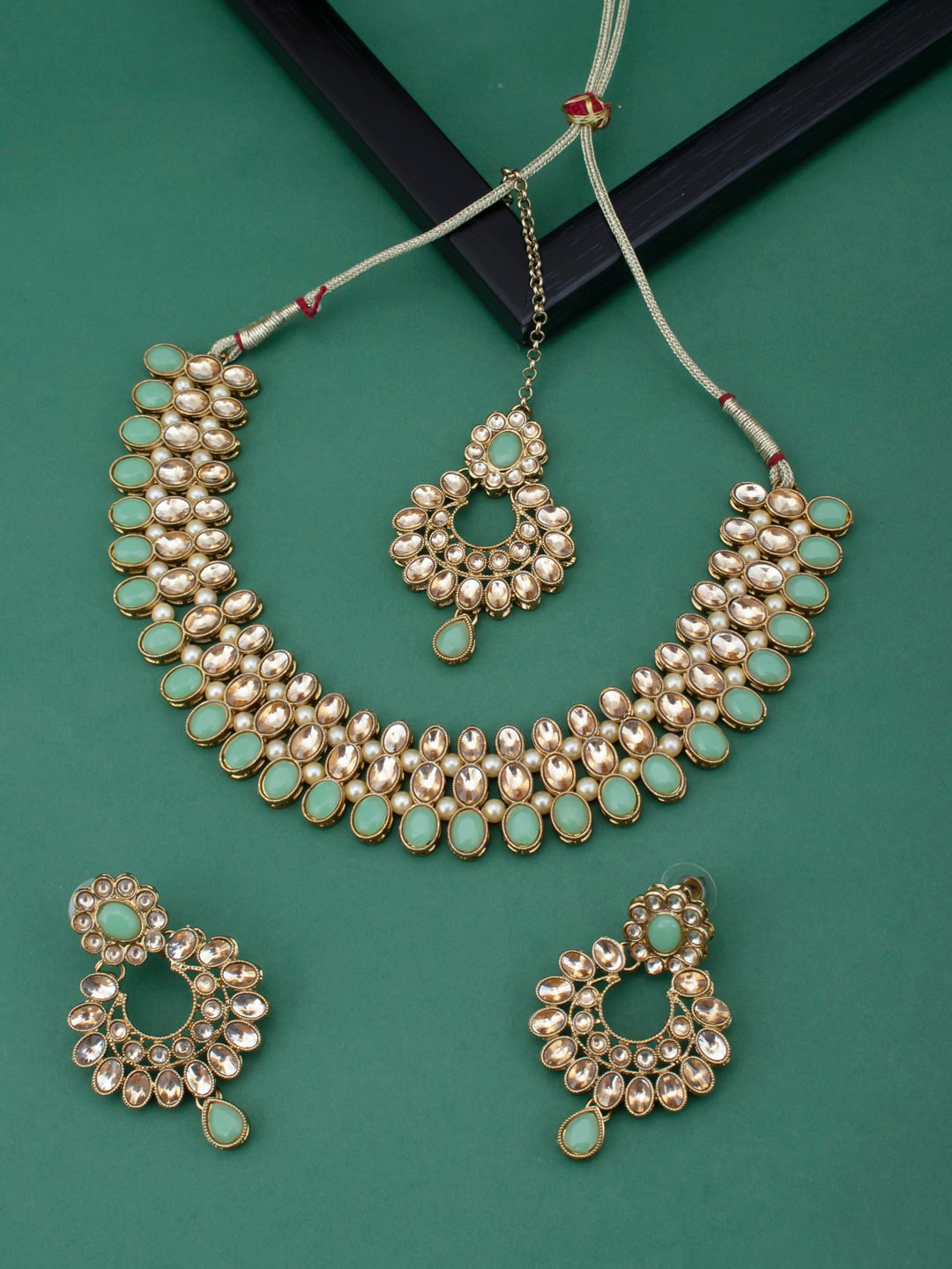 

Sukkhi LCT Gold-Plated Green & White Stone-Studded Sustainable Jewellery Set
