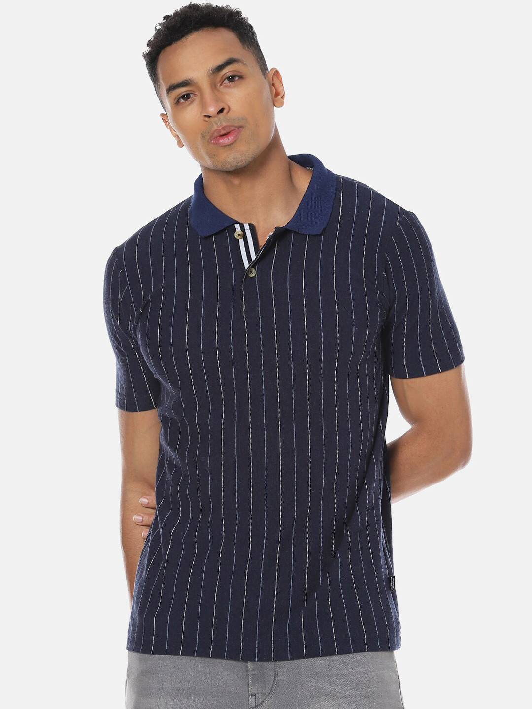 

Campus Sutra Men Navy Blue Striped Polo Collar T-shirt