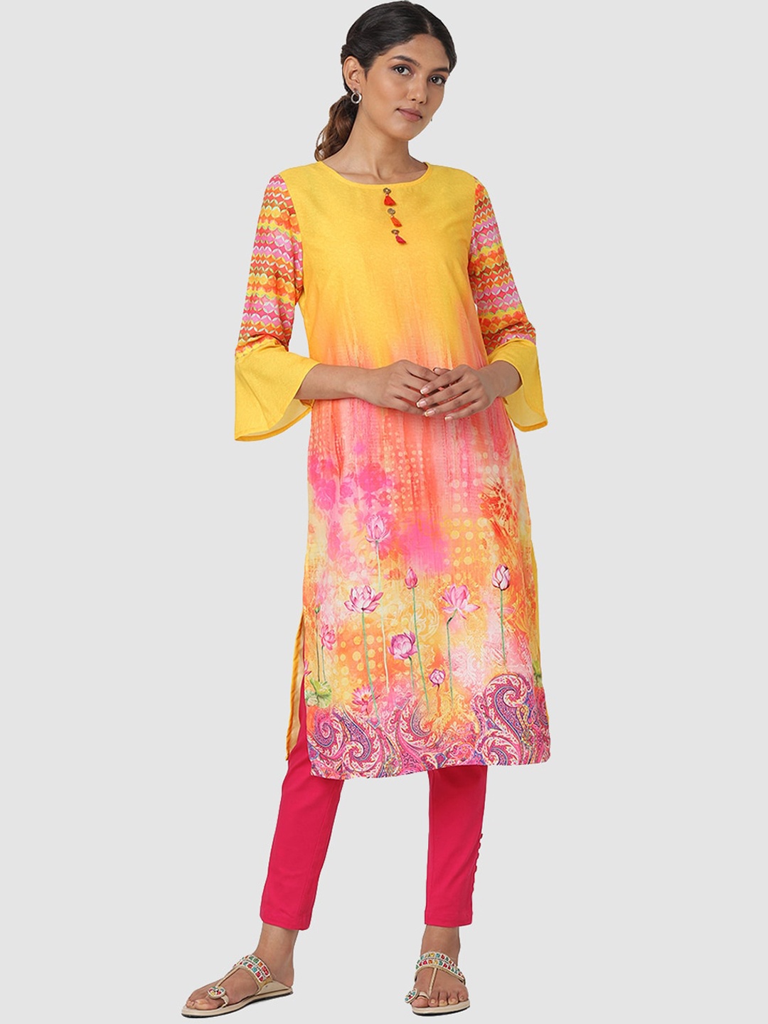 

Naari Women Yellow Floral Printed Bell Sleeves Kurta