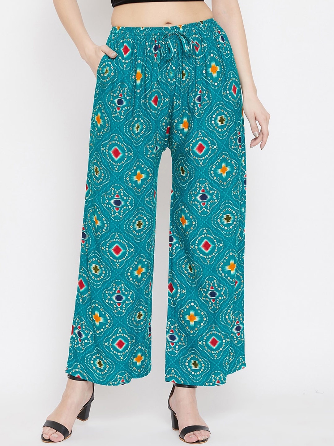 

Clora Creation Women Teal & White Printed Straight Palazzos