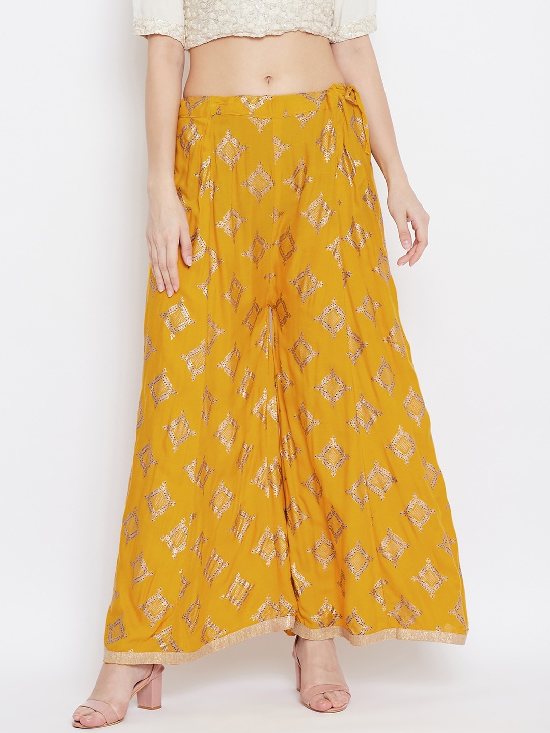 

Clora Creation Women Mustard Printed Flared Palazzos