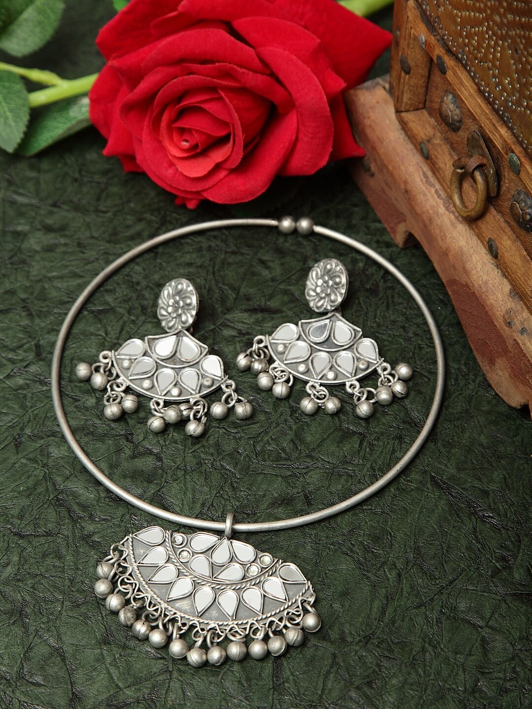

Moedbuille Mirror and Ghungroo Studded Oxidised Silver Plated Handcrafted Afghan Jewelry Set
