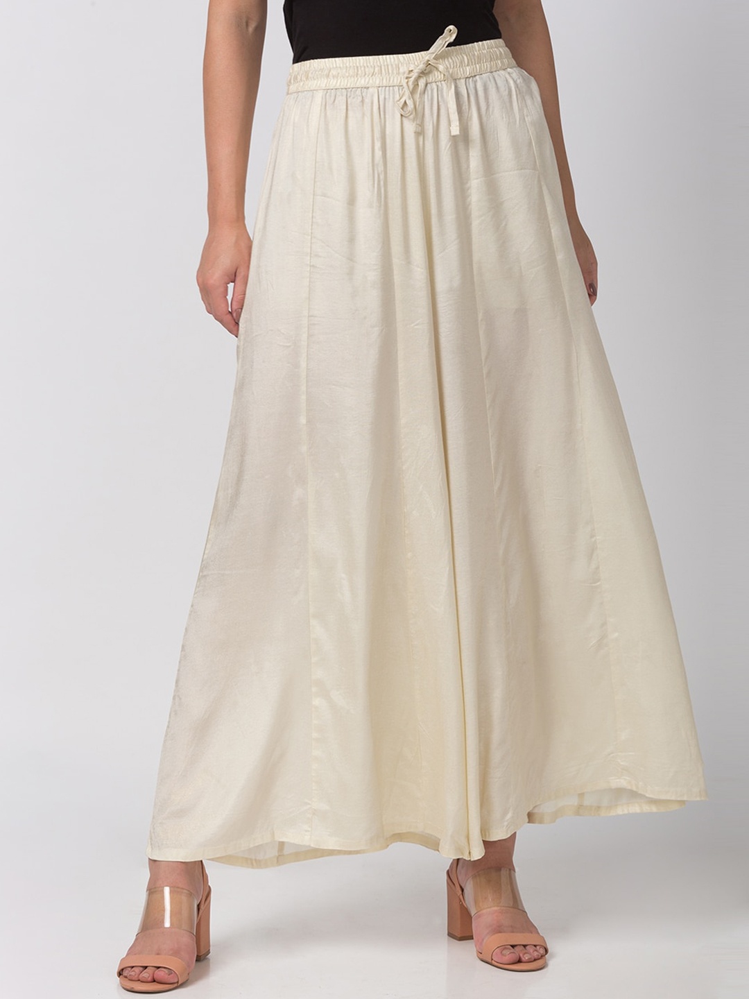 

Ethnicity Women Off-White Solid Flared Palazzos