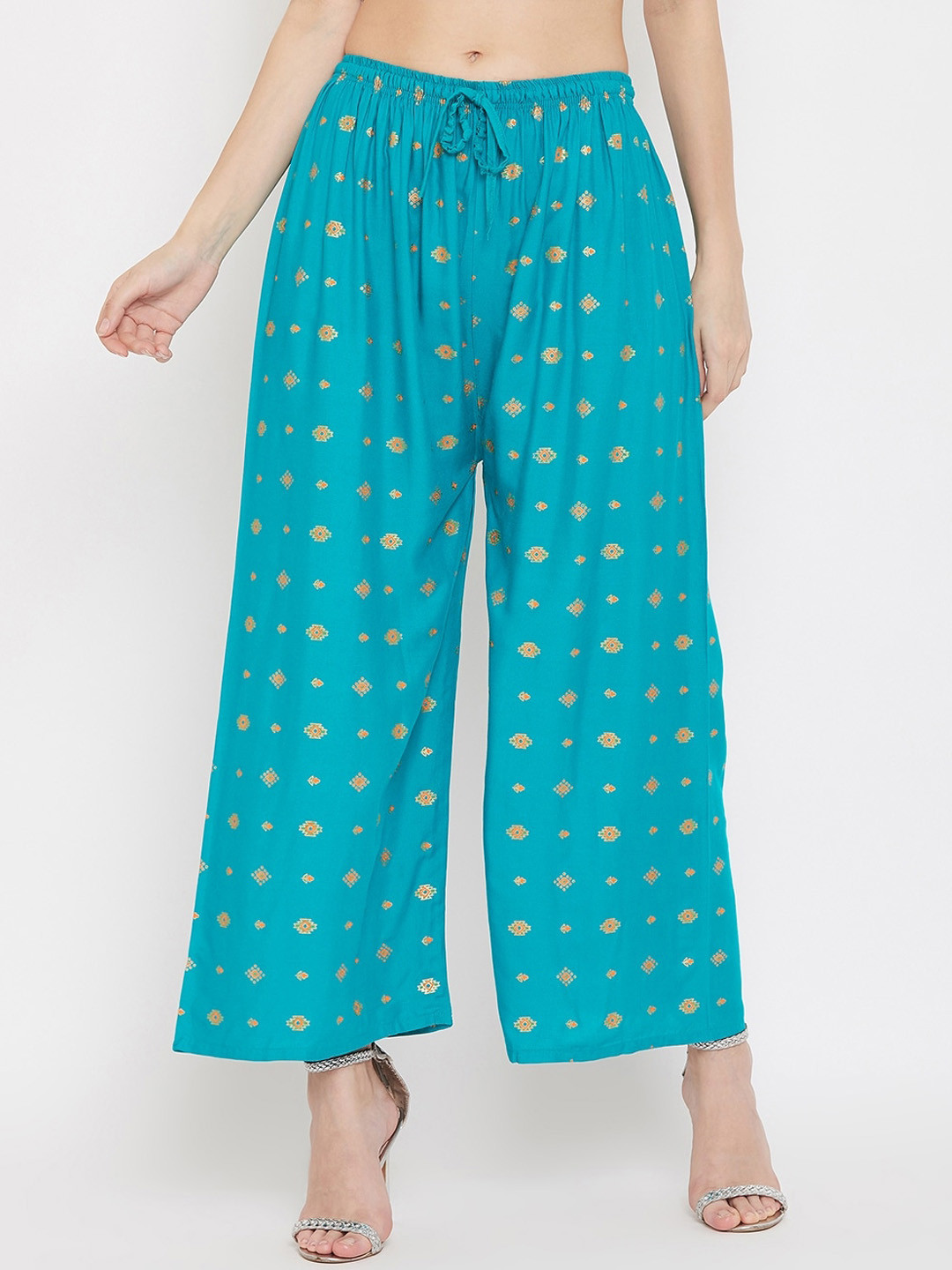 

Clora Creation Women Turquoise Blue & Gold-Toned Printed Flared Palazzos