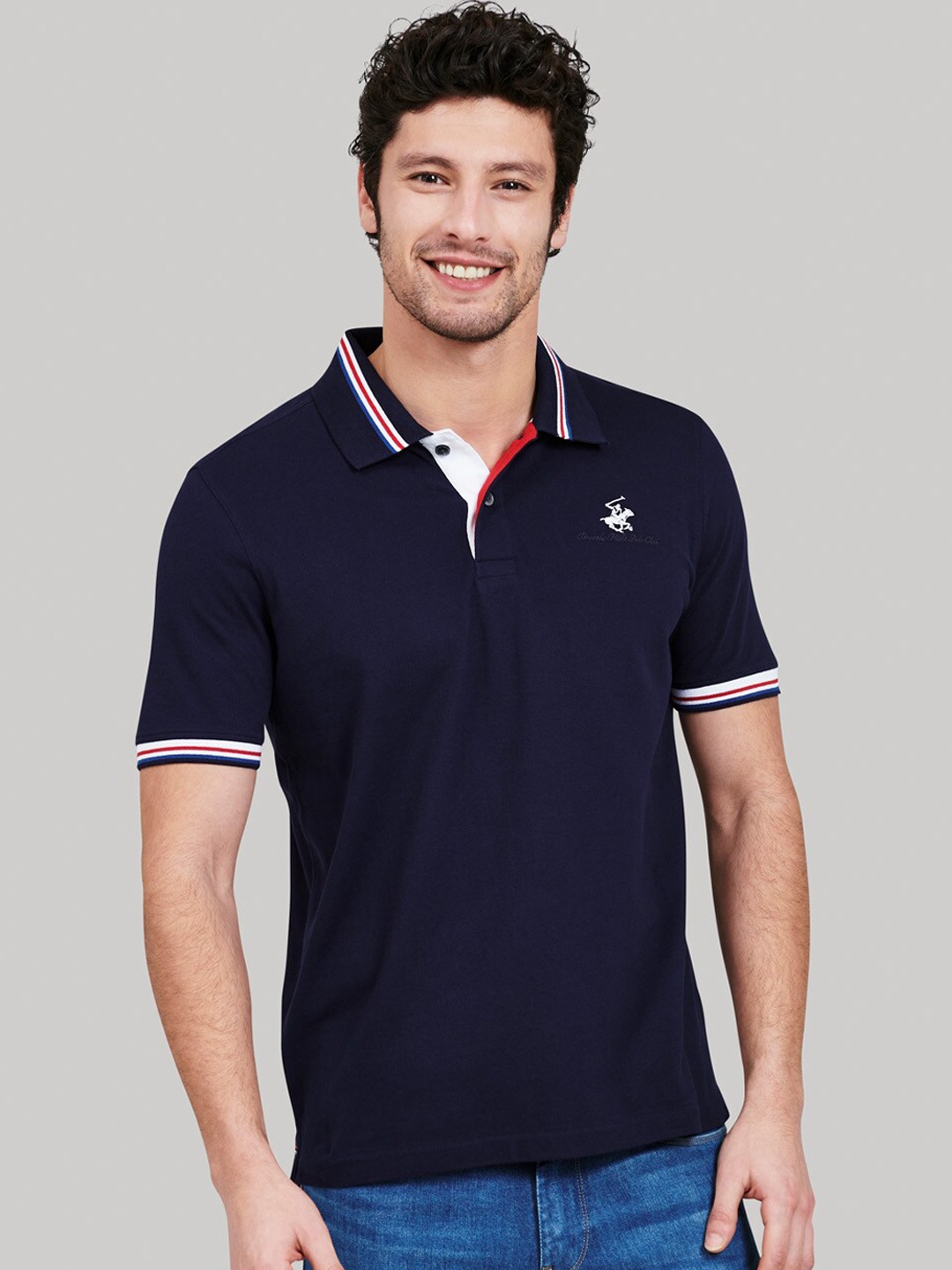 

Beverly Hills Polo Club Men Navy Blue Solid Polo Collar T-shirt