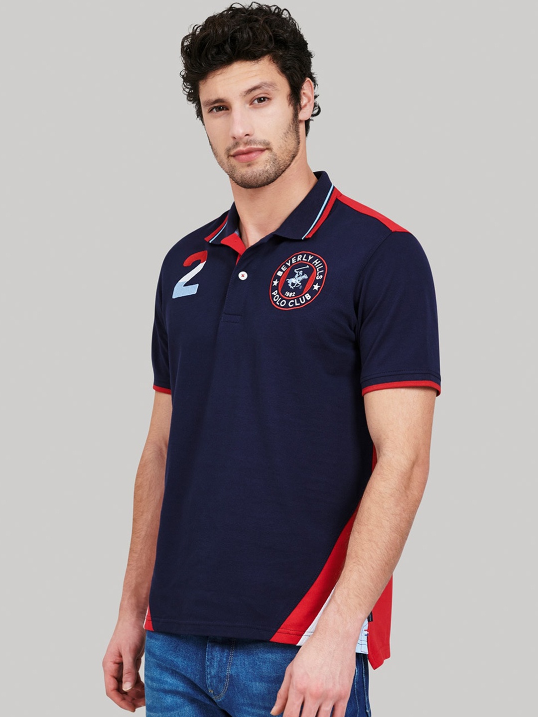 

Beverly Hills Polo Club Men Navy Blue & Red Colourblocked Polo Collar T-shirt