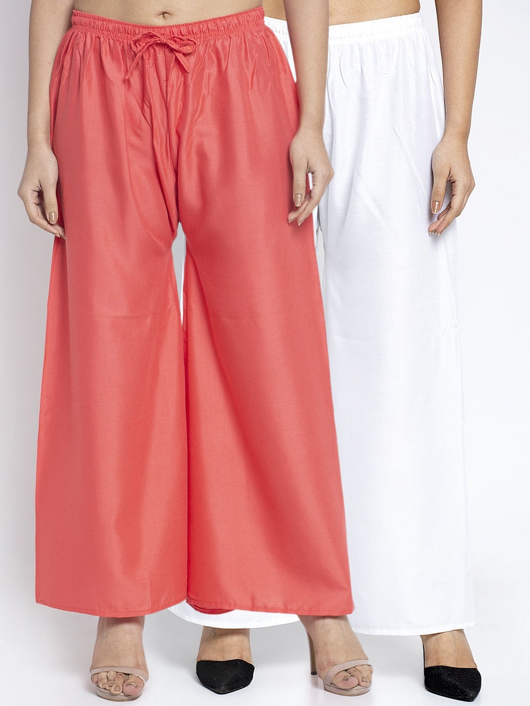 

GRACIT Women White & Peach-Coloured Solid Flared Palazzos