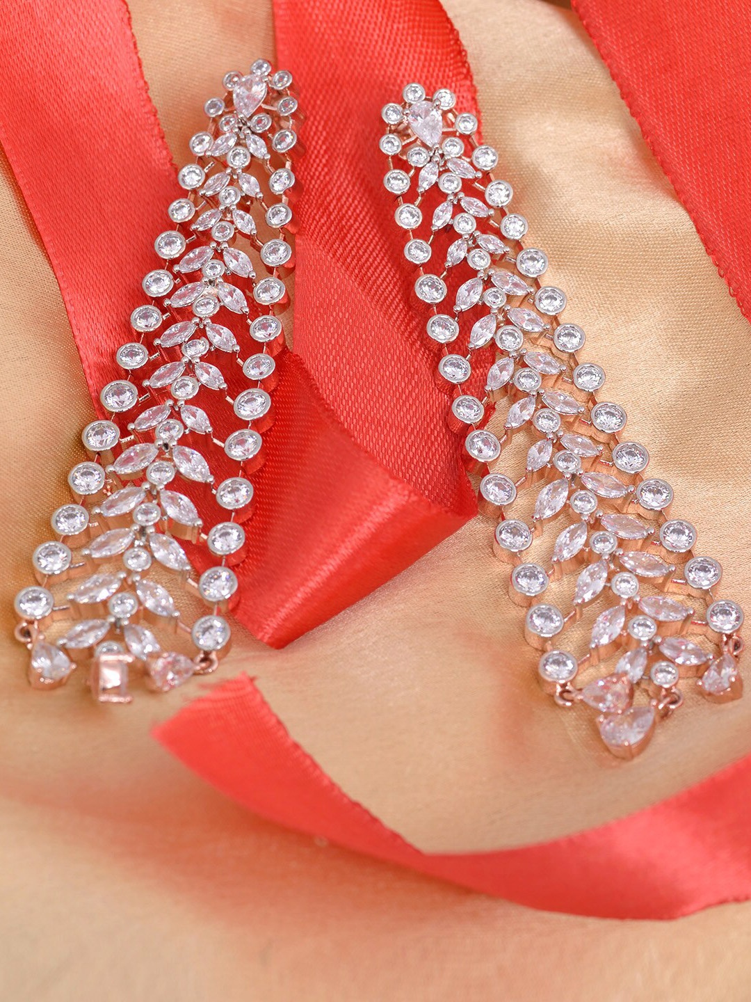 

Saraf RS Jewellery White Contemporary Jhumkas