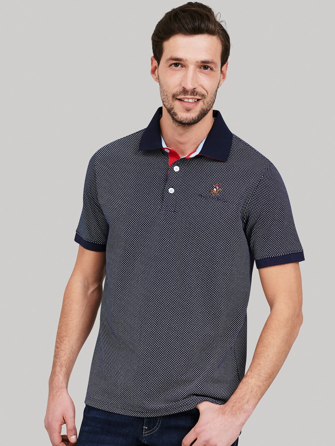 

Beverly Hills Polo Club Men Navy Blue Self Design Polo Collar T-shirt