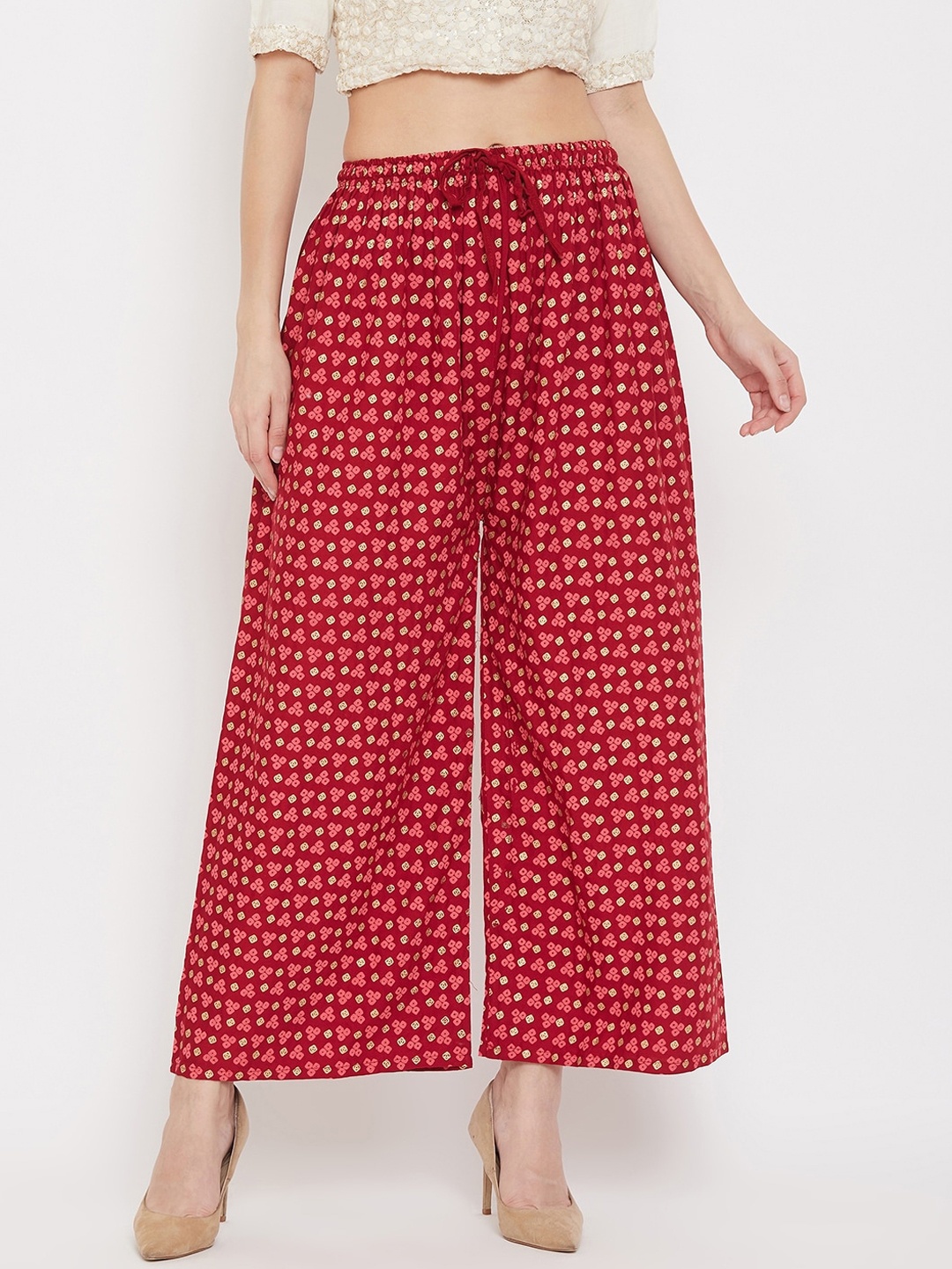

Clora Creation Women Maroon & Gold-Toned Printed Flared Palazzos