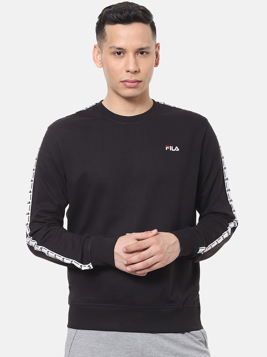 

FILA Men Black Solid Sweatshirt