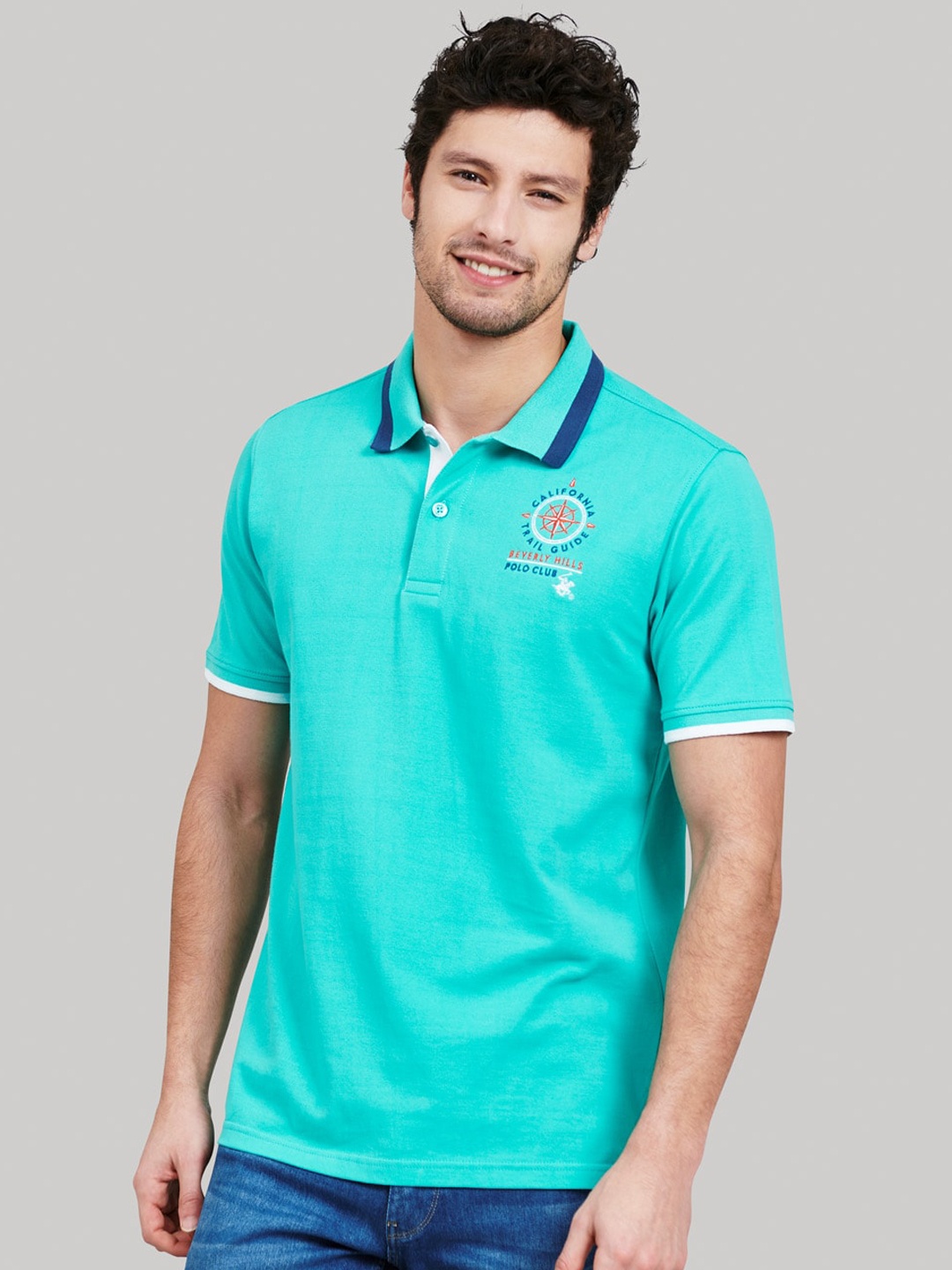 

Beverly Hills Polo Club Men Turquoise Blue Solid Polo Collar T-shirt