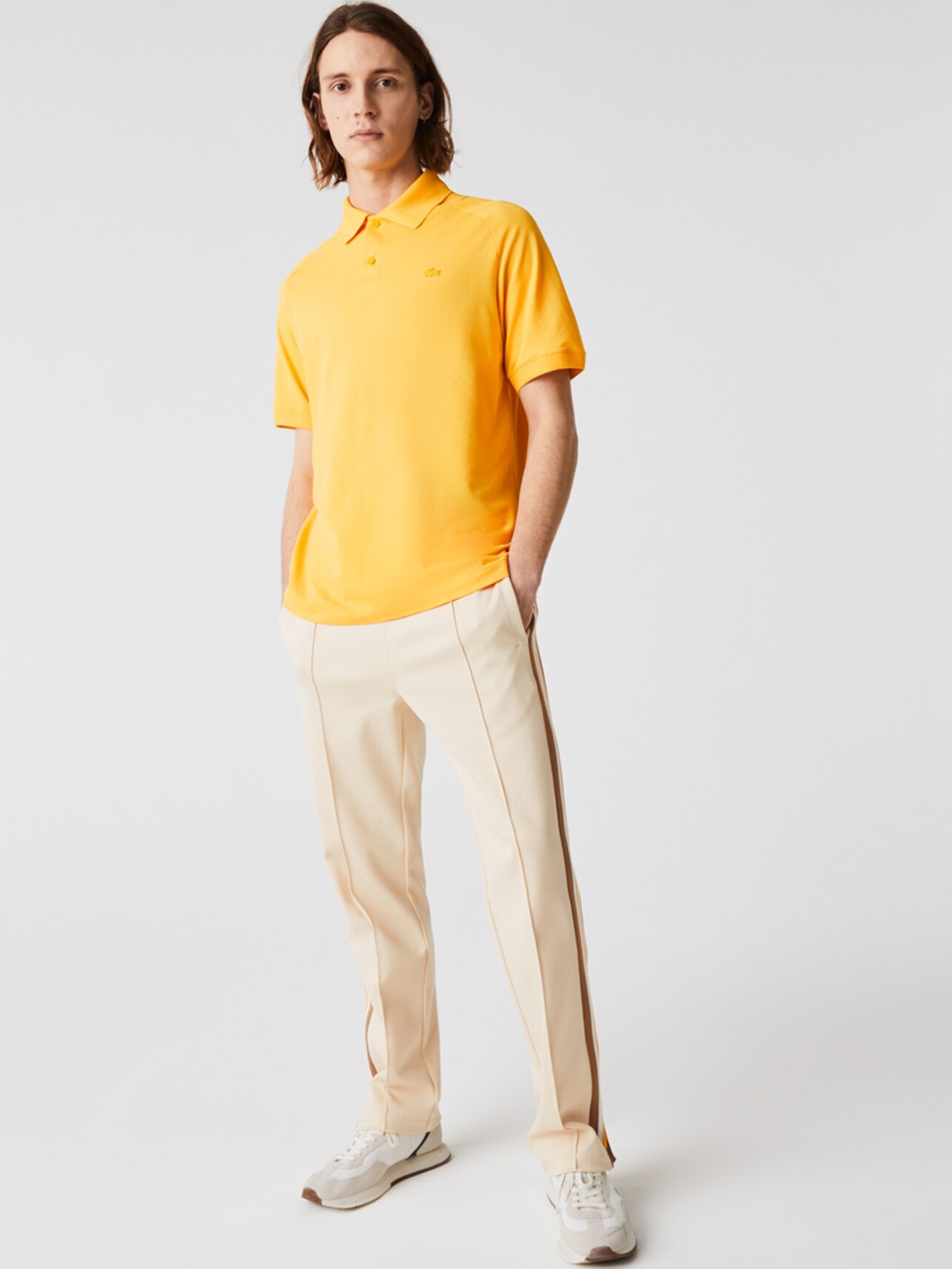 

Lacoste Men Yellow Solid Polo Collar T-shirt