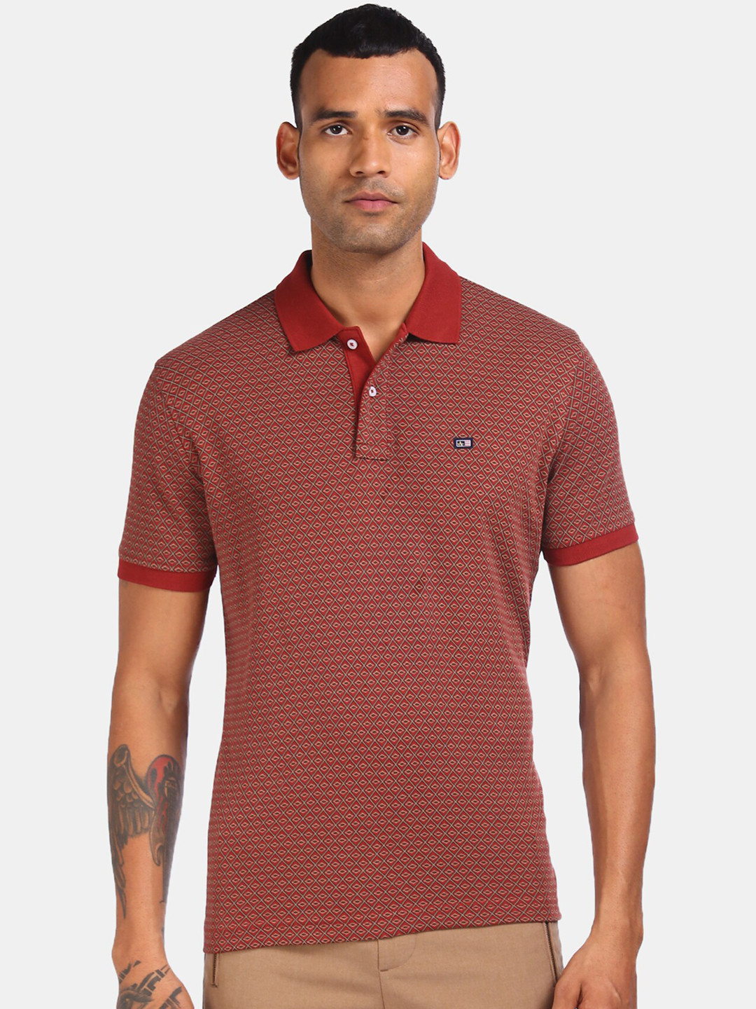 

Arrow Sport Men Red Solid Polo Collar T-shirt