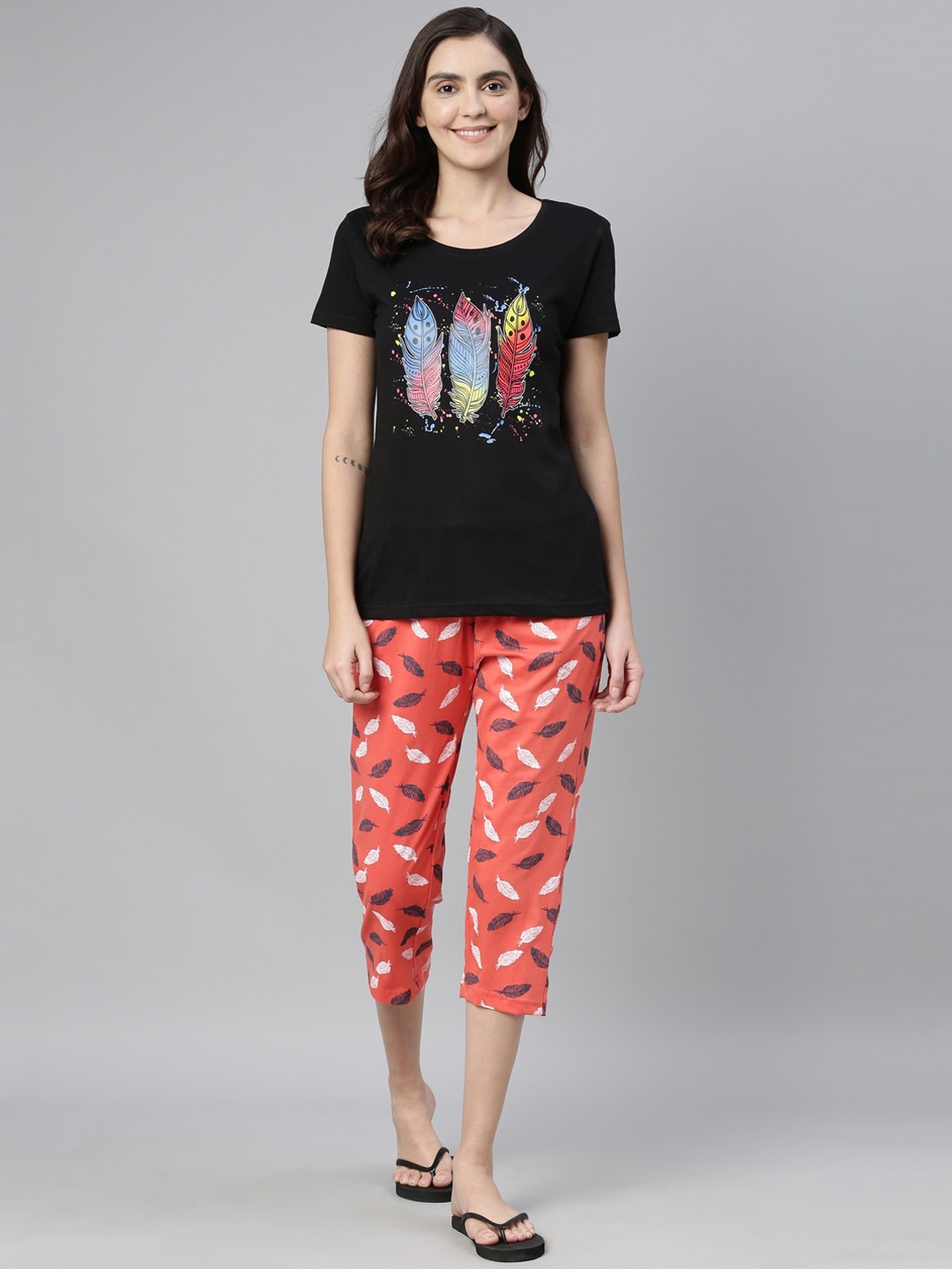 

Kryptic Women Black & Orange Printed Night Suit
