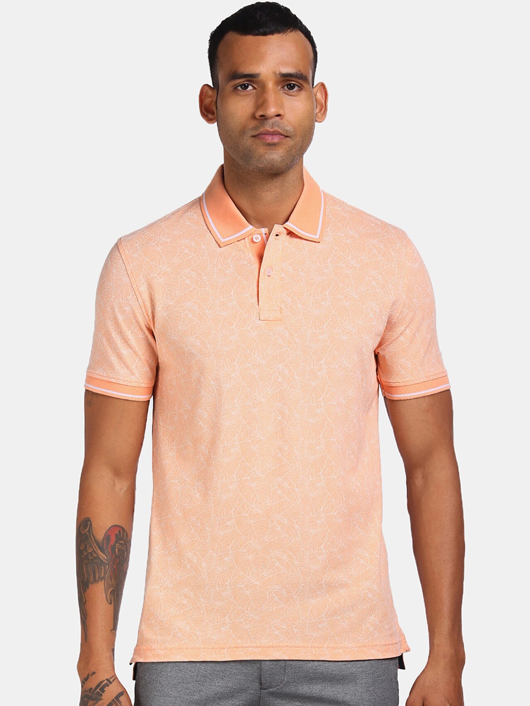 

Arrow Sport Men Orange Self Design Polo Collar T-shirt