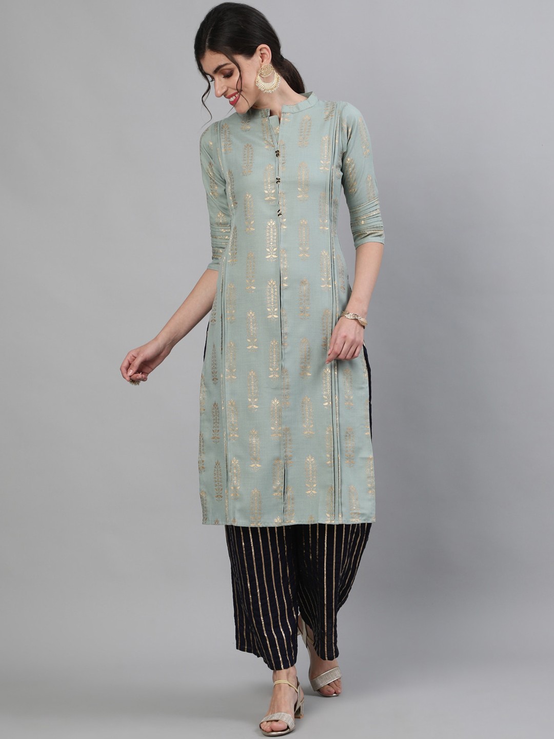 

Ishin Women Sea Green Self Design Kurti with Trousers