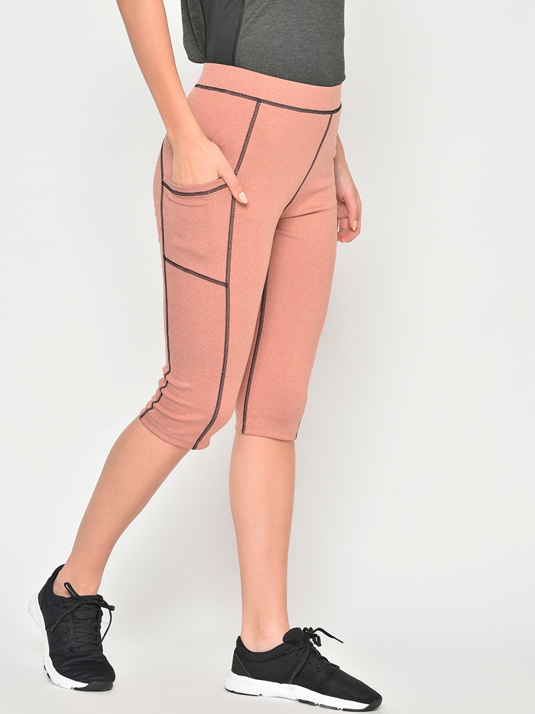 

Chkokko Women Peach-Coloured Black Solid Skinny Fit Gym Capris