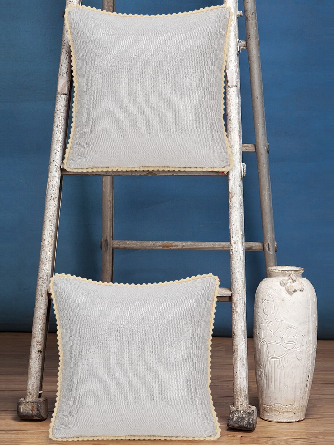 

Mezposh Silver-Toned & Cream-Coloured Set of 2 Self Design Square Cushion Covers