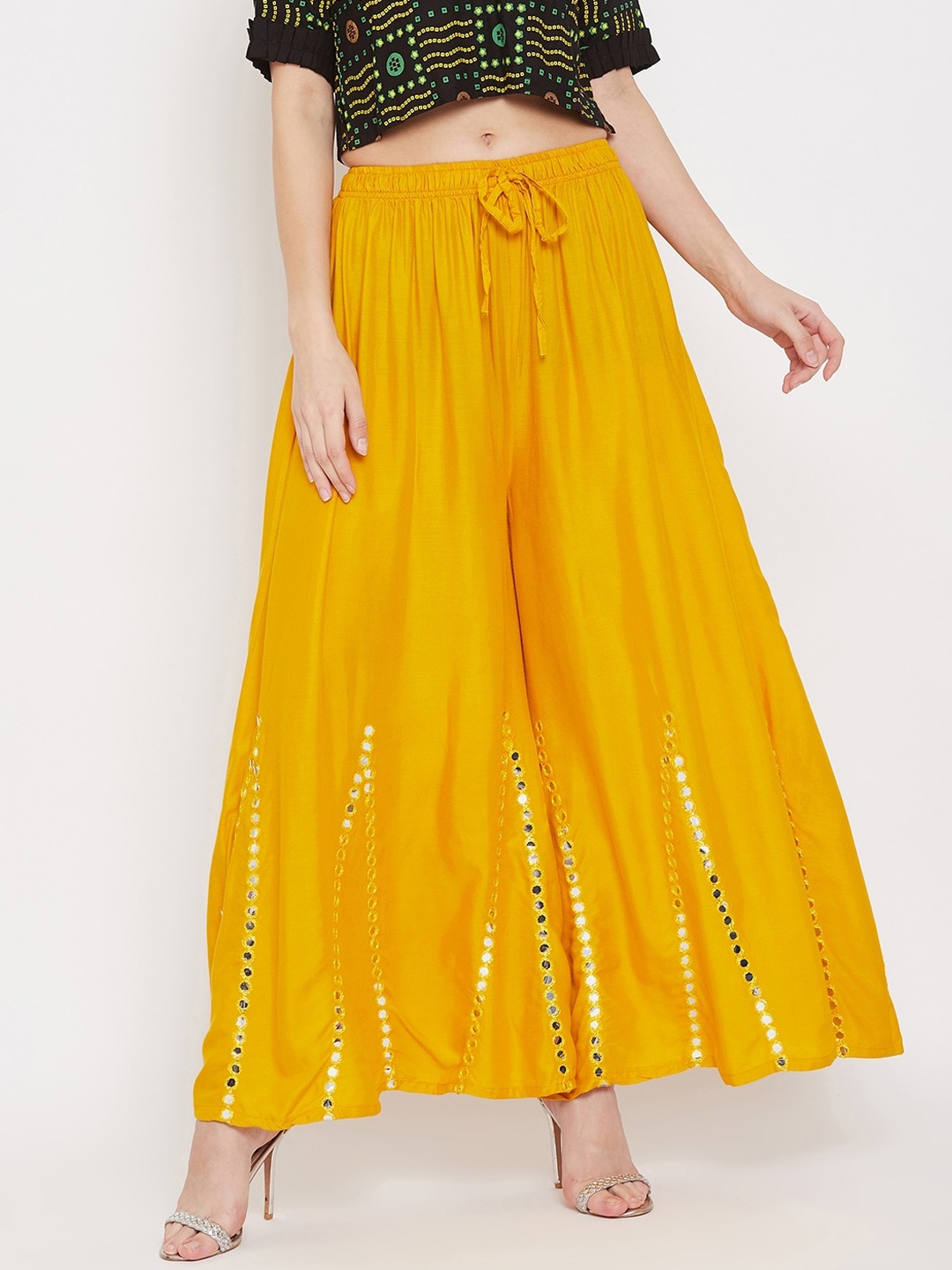 

Clora Creation Women Mustard & White Embellished Flared Palazzos