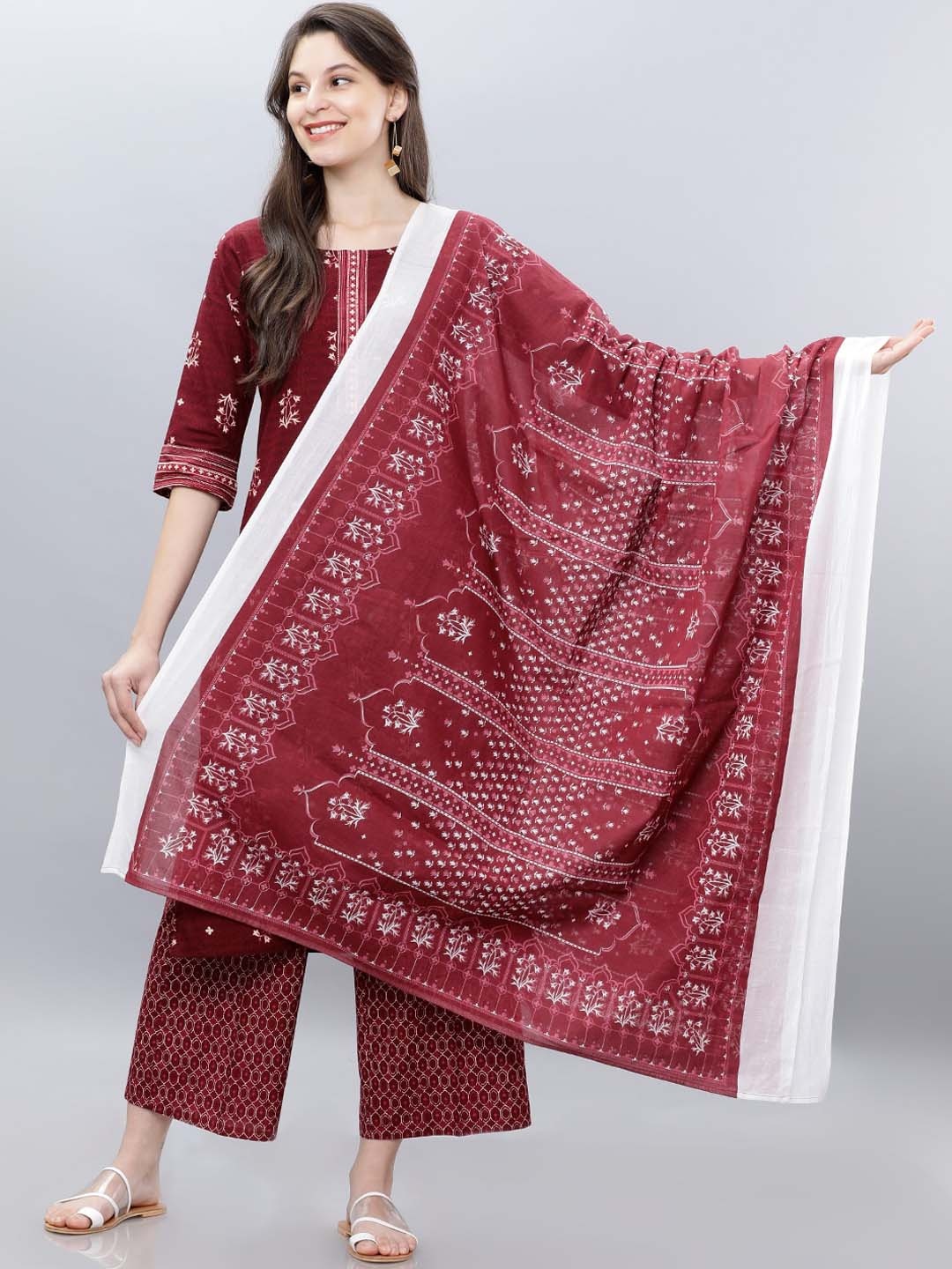 

Vishudh Women Maroon Printed Kurta with Palazzo and Dupatta
