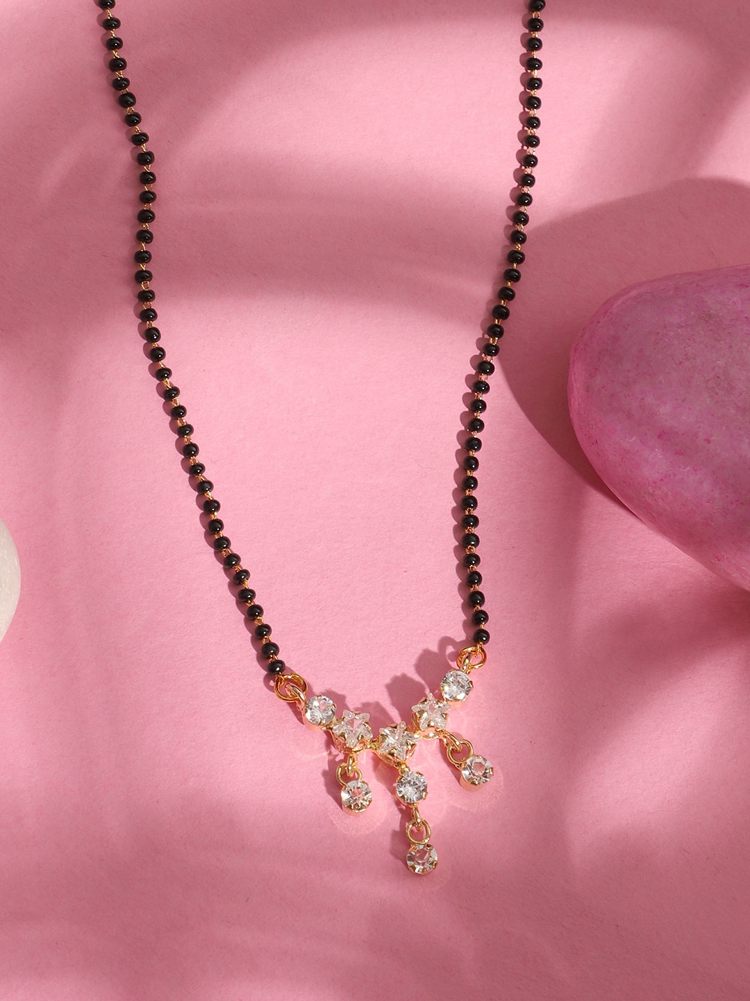 

ANIKAS CREATION Gold-Plated & Black Stone-Studded & Beaded Mangalsutra