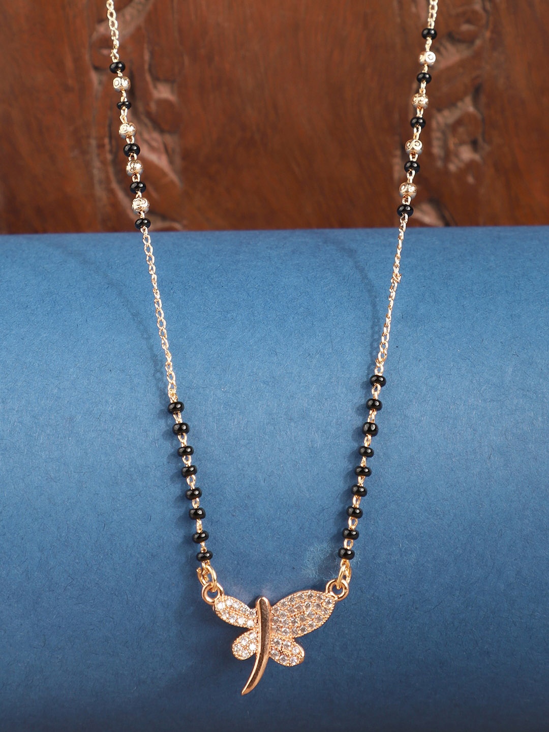 

ANIKAS CREATION Gold-Plated Black & White AD-Studded Beaded Traditional Mangalsutra