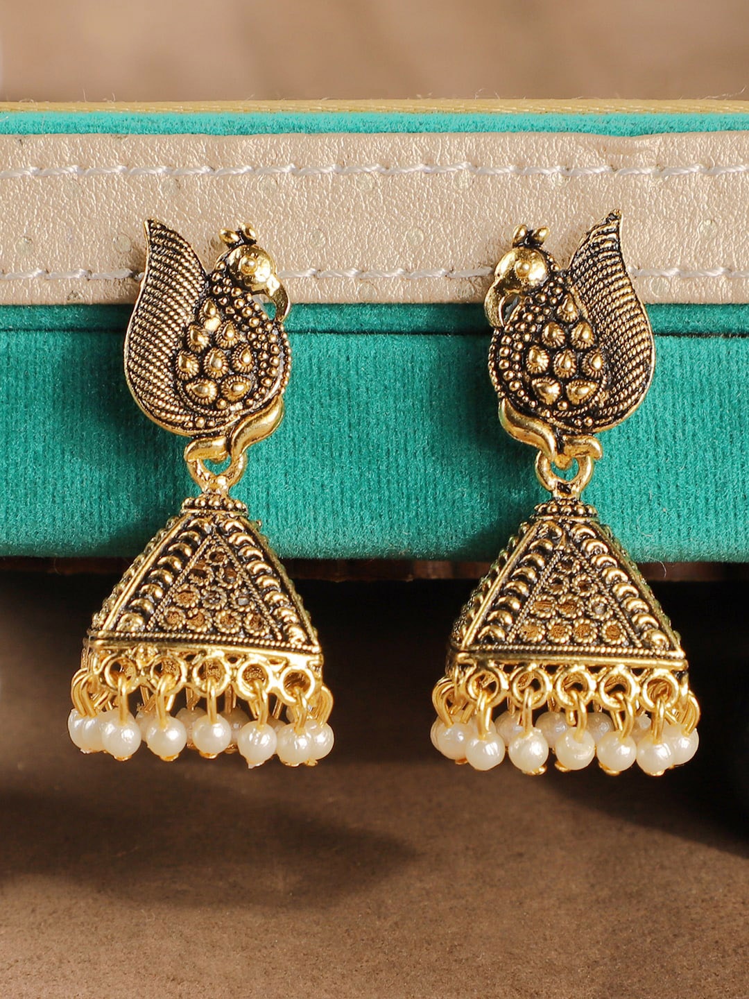 

ANIKAS CREATION Gold-Toned Peacock Shaped Jhumkas