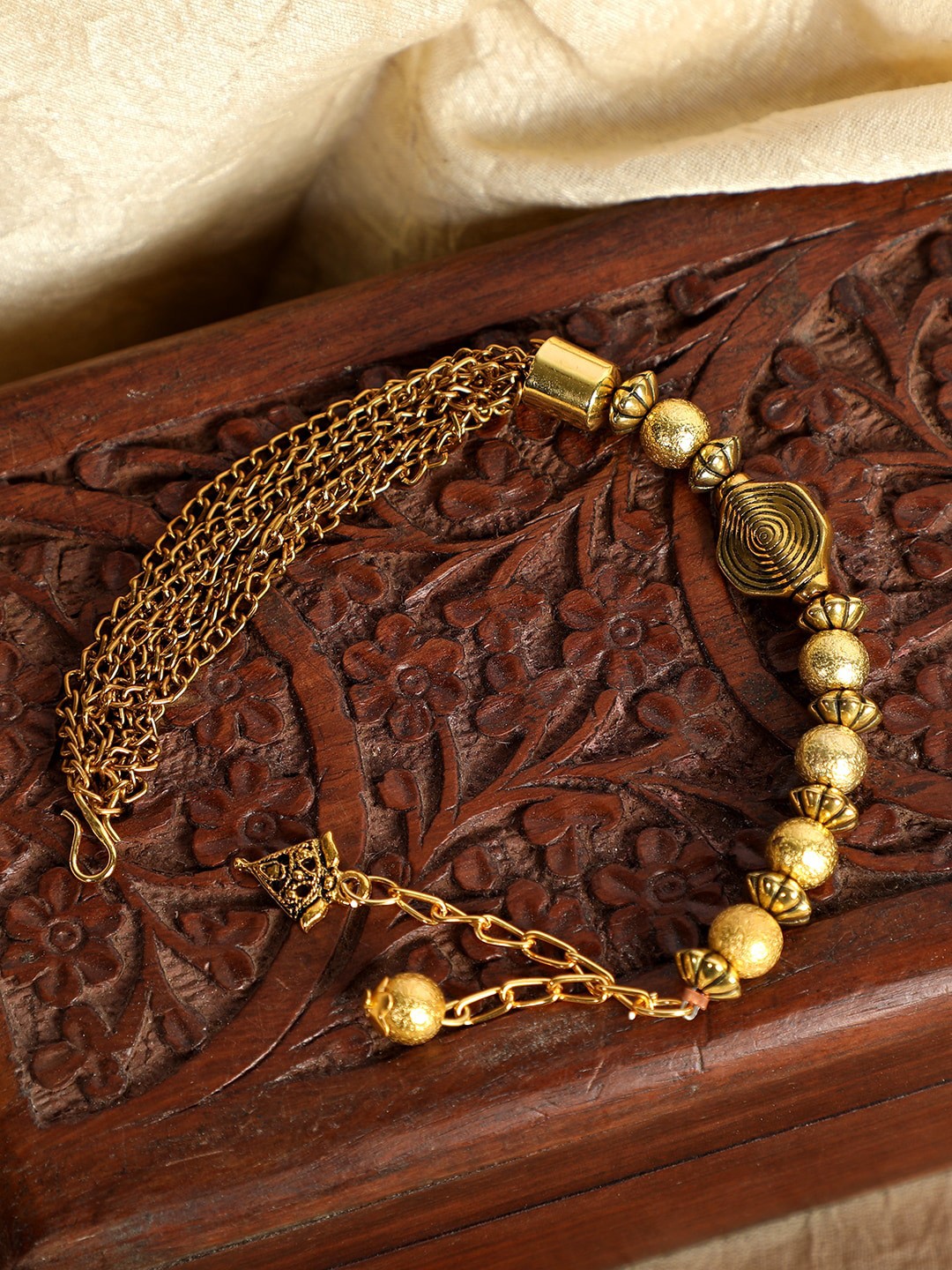 ANIKAS CREATION Gold-Toned Handcrafted Charm Adjustable Bracelet