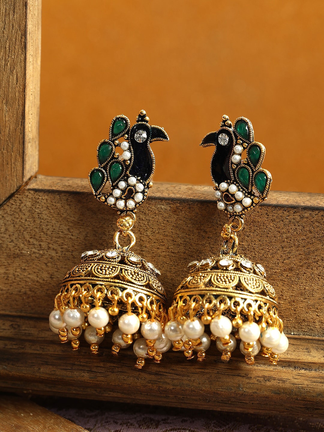 

ANIKAS CREATION Green & Gold-Plated Antique Peacock Shaped Jhumkas