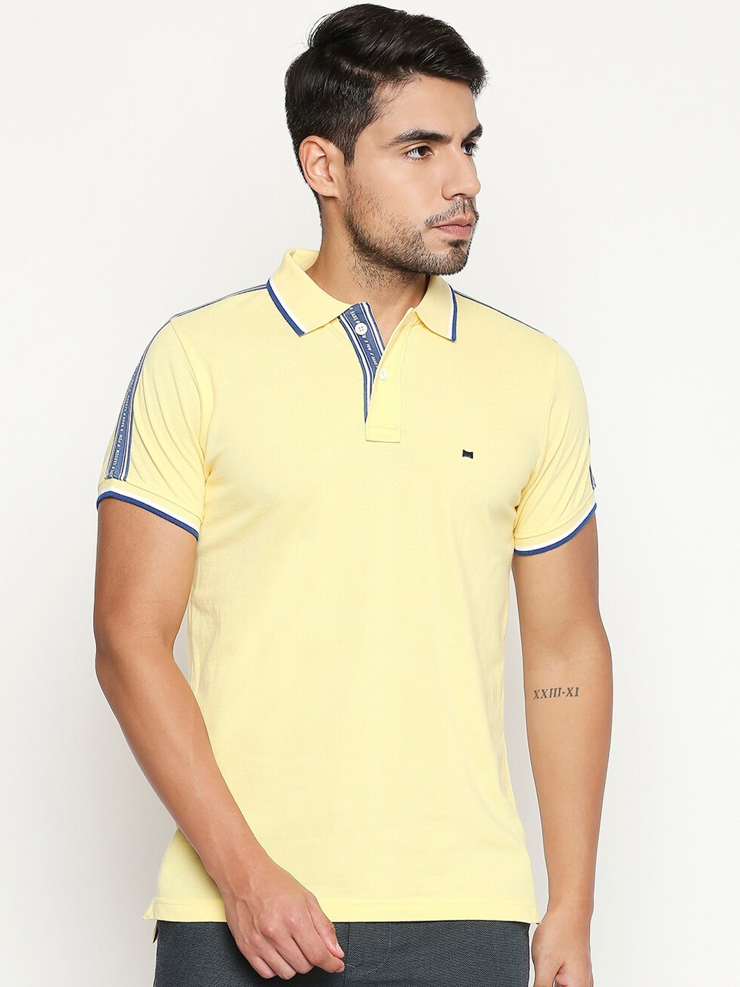 

Basics Men Yellow Solid Organic Cotton Muscle Fit Polo Collar T-shirt