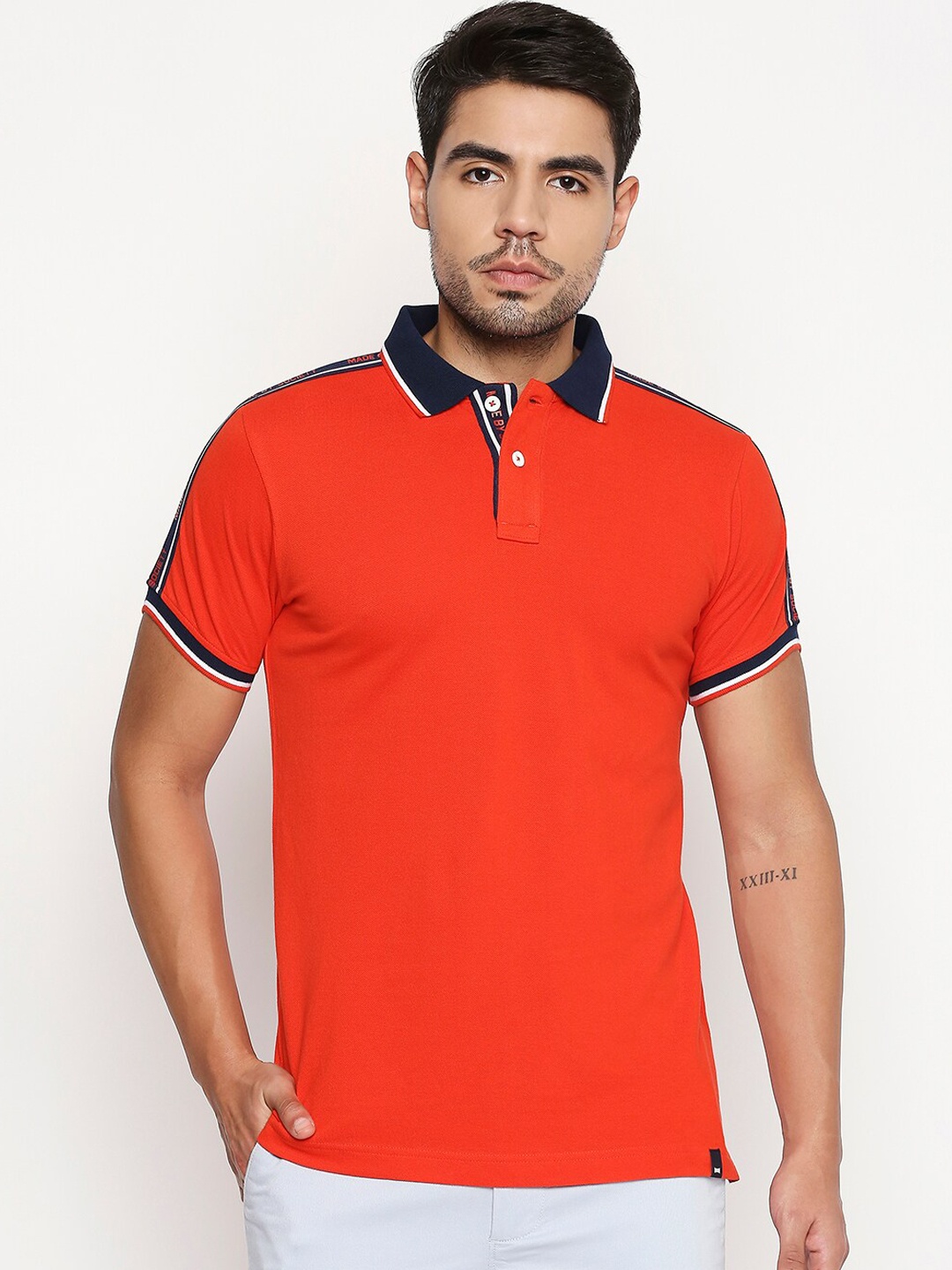 

Basics Men Coral Red Solid Polo Collar T-shirt