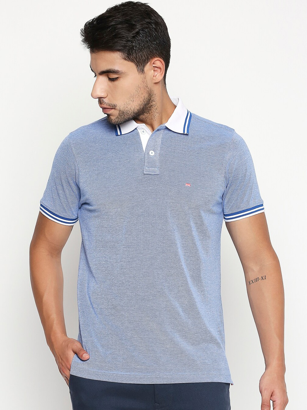 

Basics Men Blue Solid Muscle Fit Polo Collar T-shirt