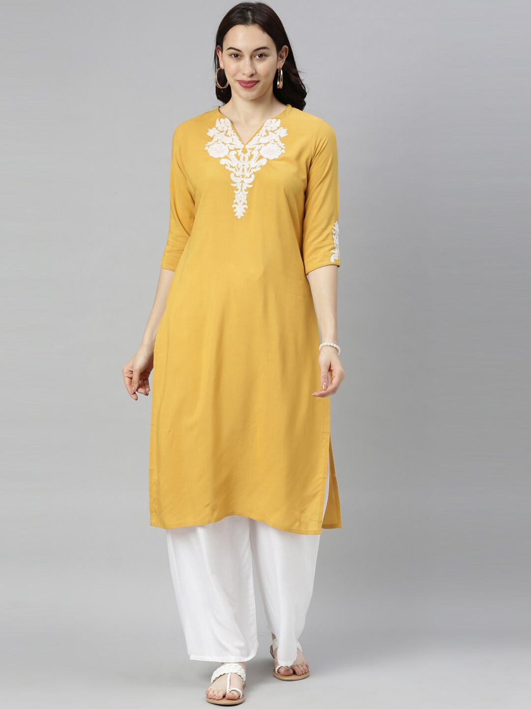 

Neerus Women Yellow Yoke Design Thread Work Kurta