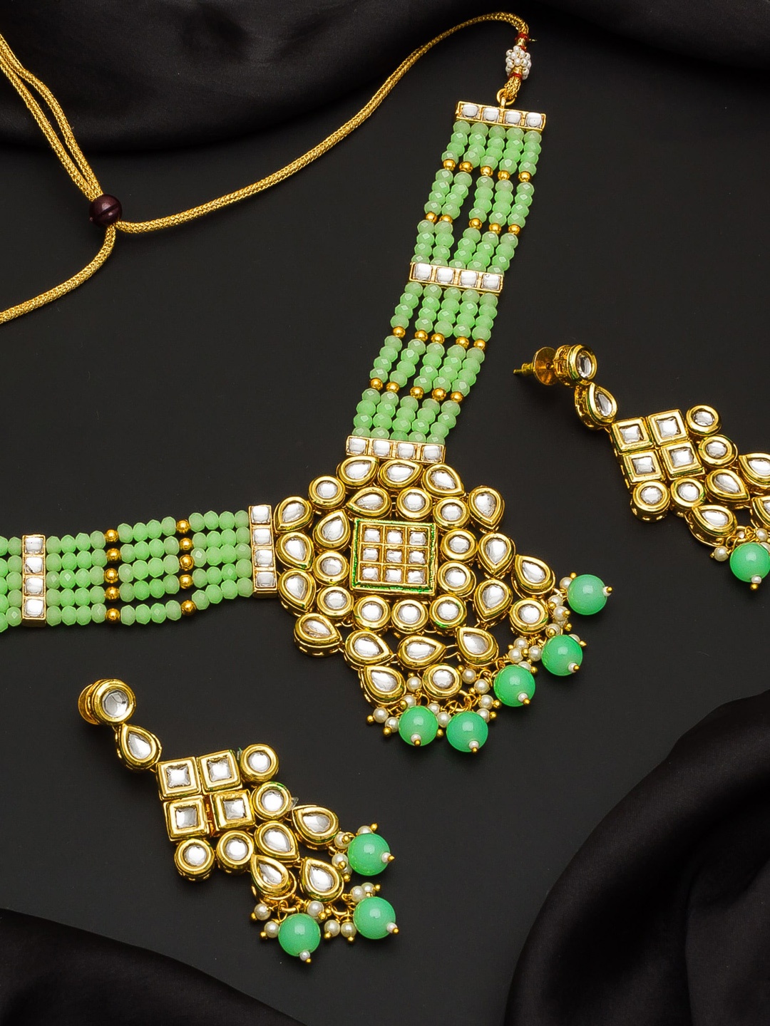 

aadita Gold-Plated & Sea Green Kundan-Studded Beaded Handcrafted Jewellery Set