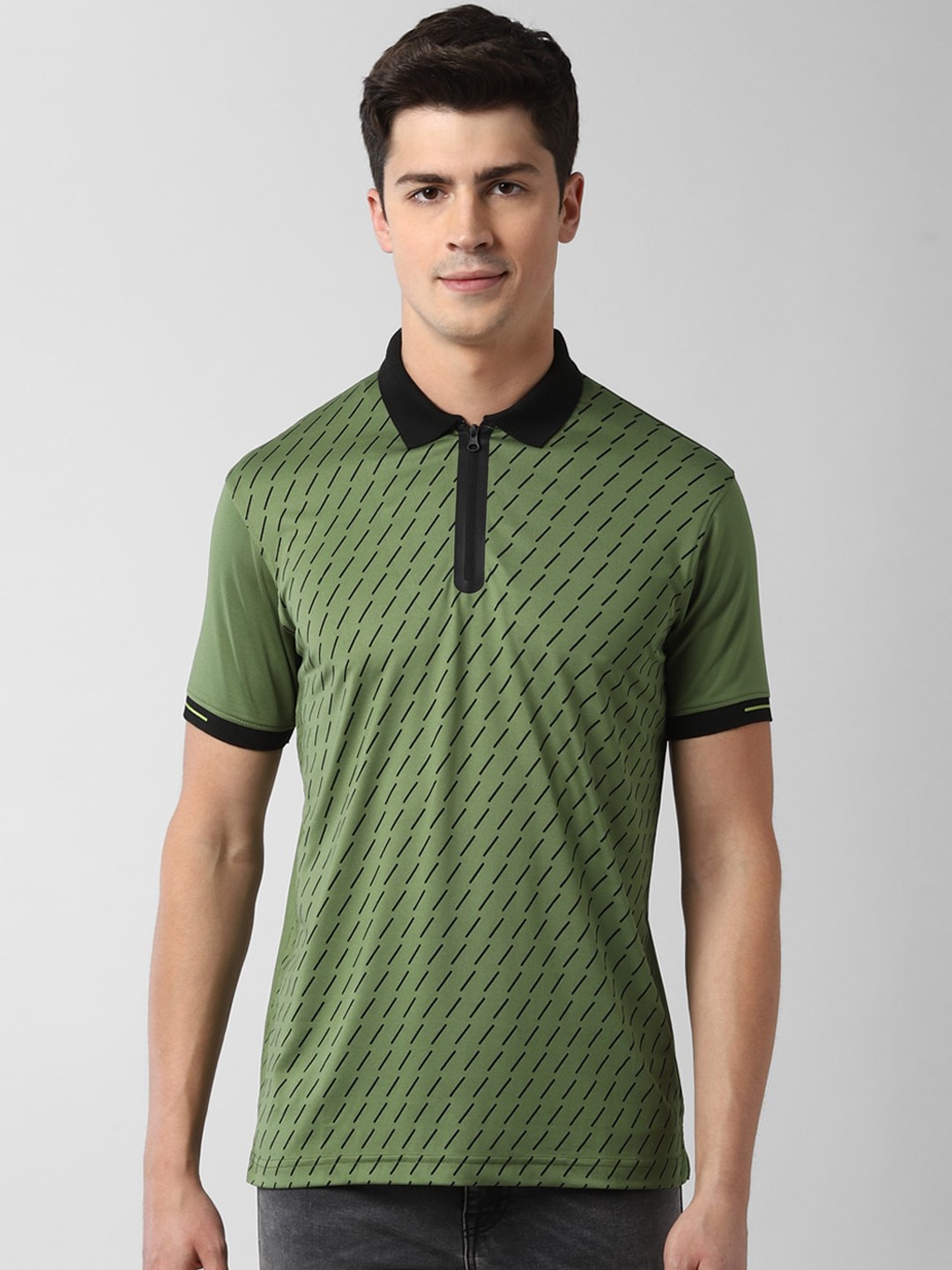 

Peter England Casuals Men Green Self Design Polo Collar T-shirt