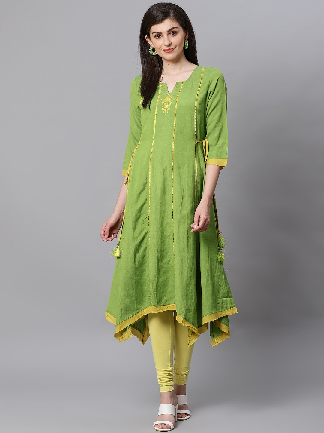 

Kifahari Women Green Solid Kurta with Churidar