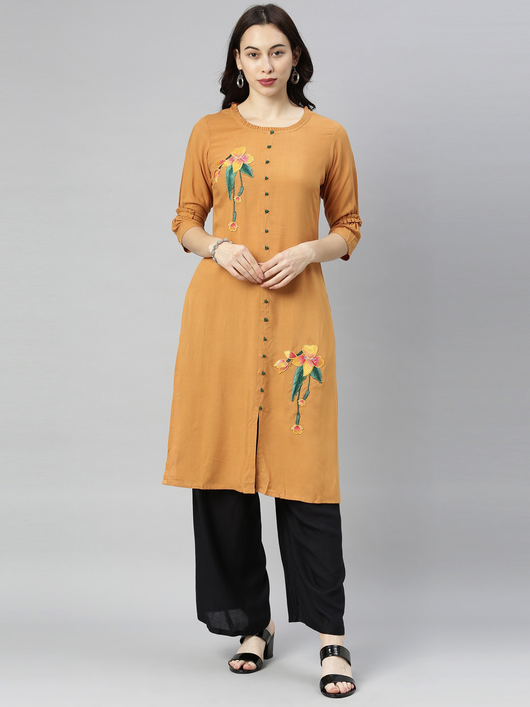 

Neerus Women Mustard Floral Embroidered Thread Work Floral Kurta