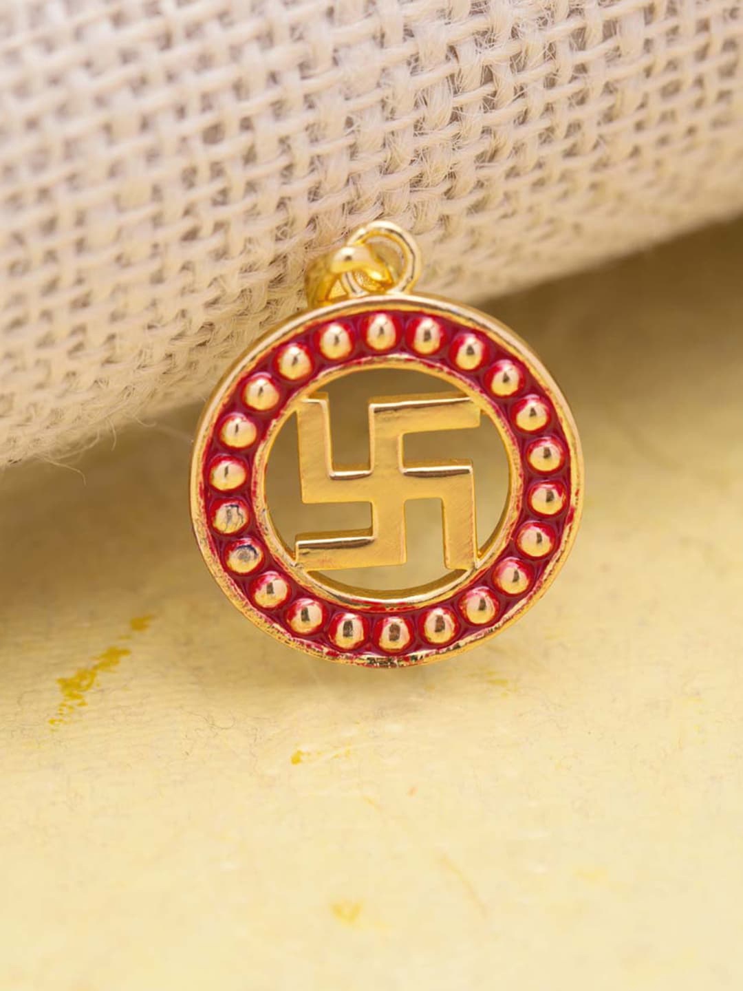 

Dare by Voylla Gold-Plated Red Enameled Border Swastika Pendant