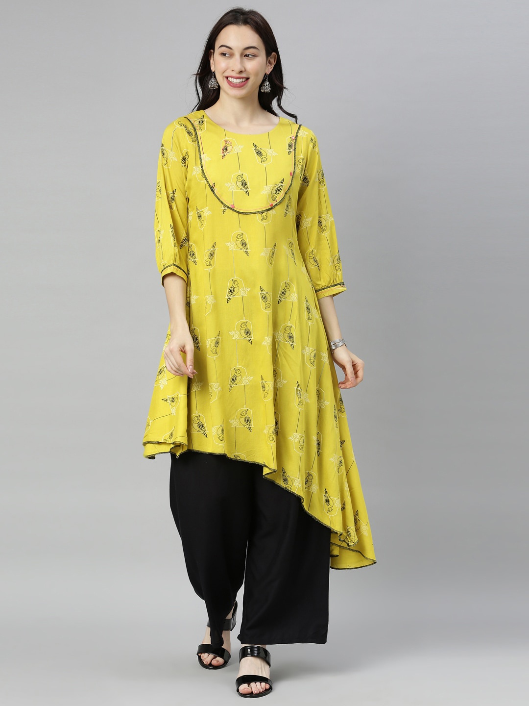 

Neerus Women Yellow Quirky Printed Kurta